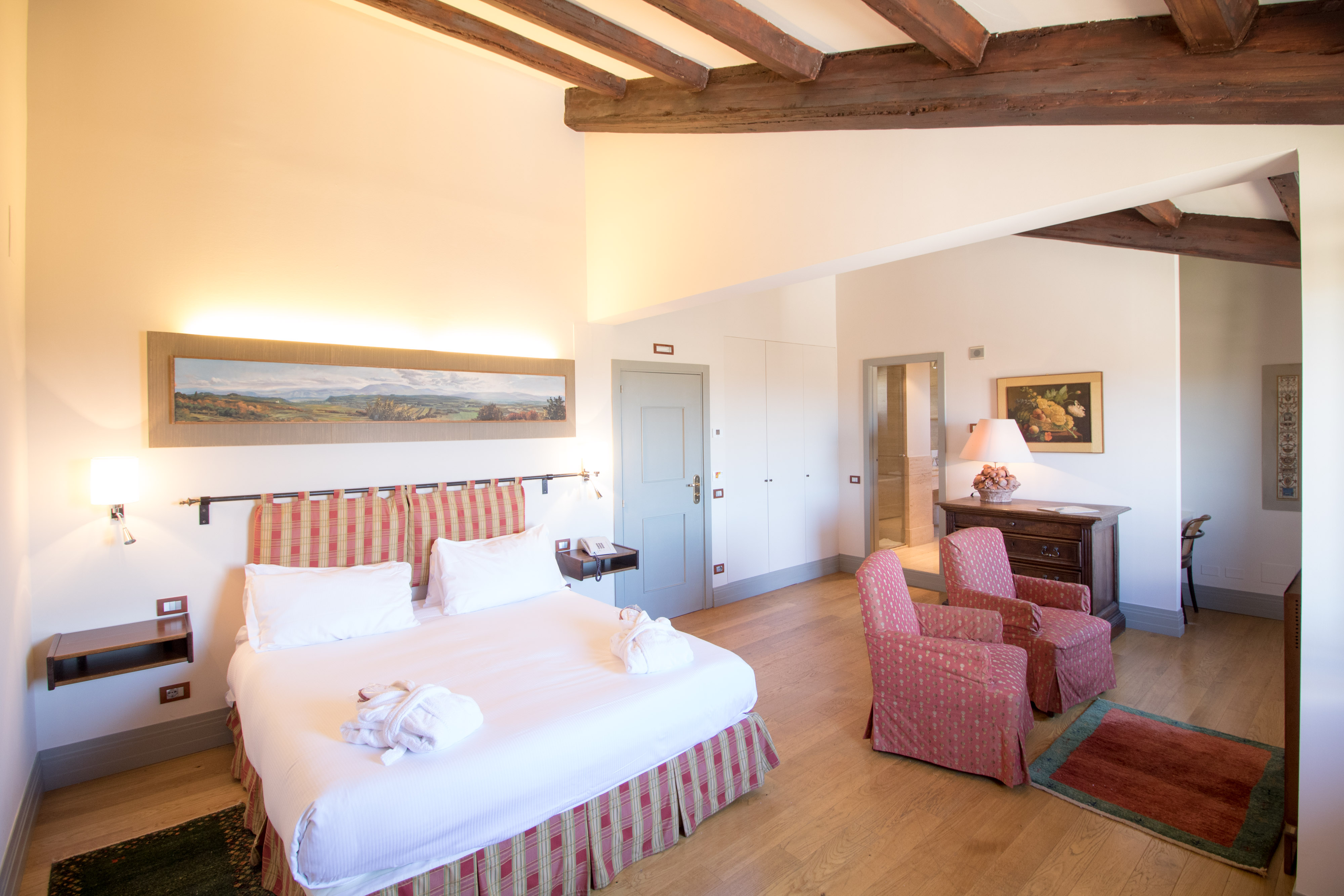 Bedroom with pink chair