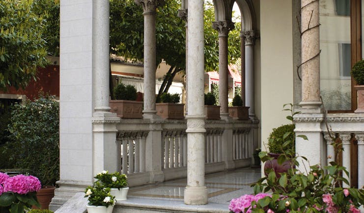 Hotel Abbazia Veneto entrance colonnade marble tiles