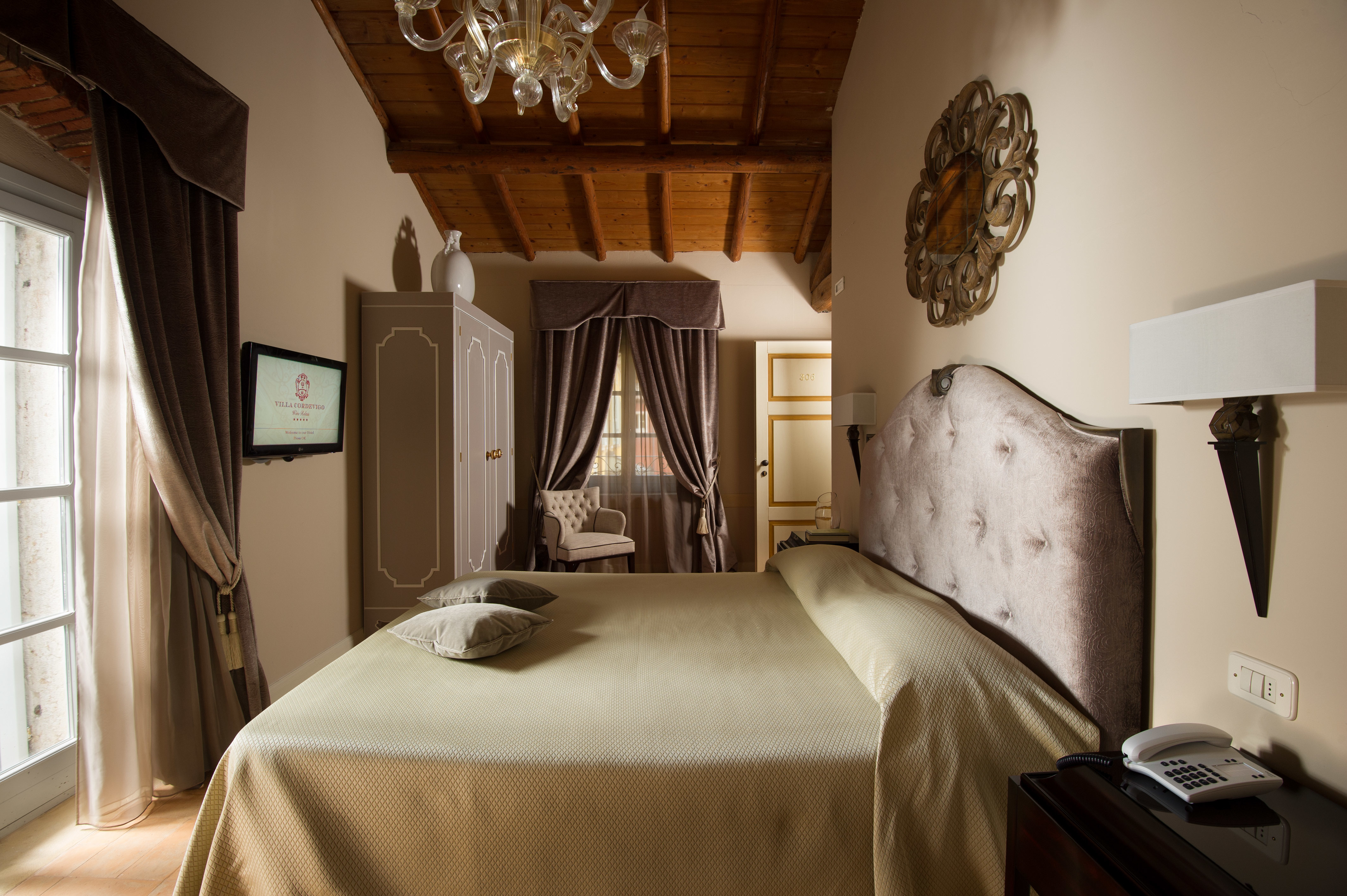 Villa Cordevigo Classic room with muted tones and elegant furnishings