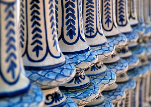 Close up shot of blue and white ceramic banisters in Plaza de Espana in Seville