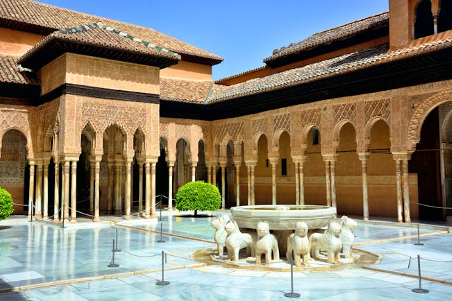 Fountain and arches of the Moorish Court of Lions at the Alhambra in Granada