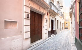 Corral del Rey Seville entrance side street wooden doors
