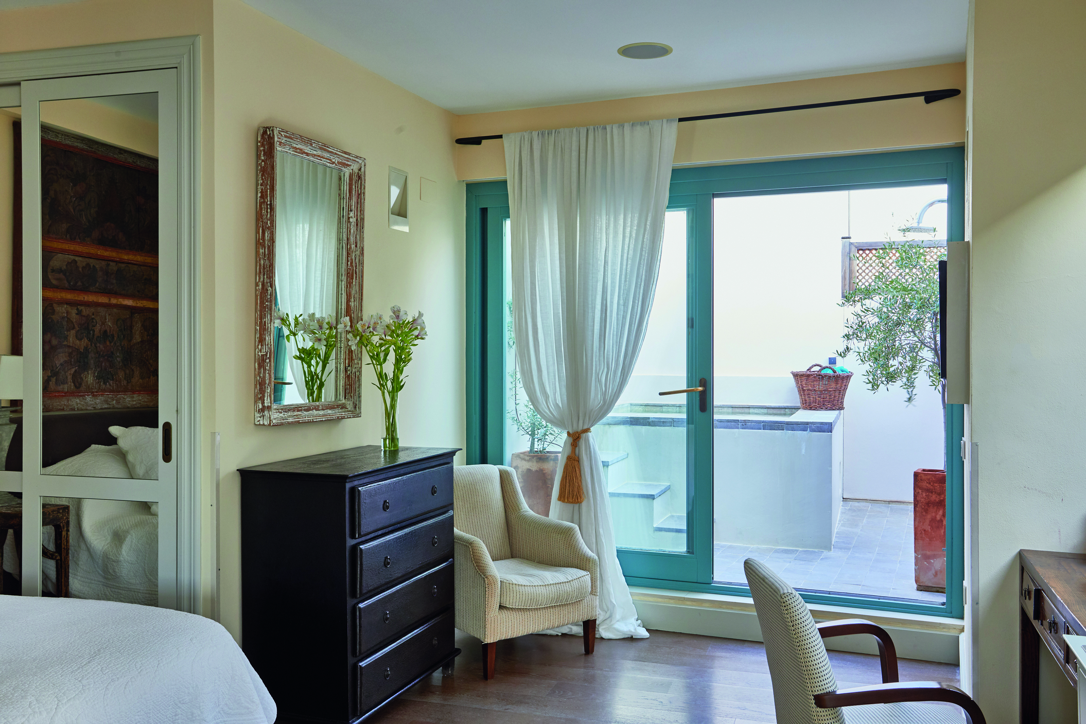 Corral del Rey Seville penthouse suite room leading to terrace and pool elegant décor