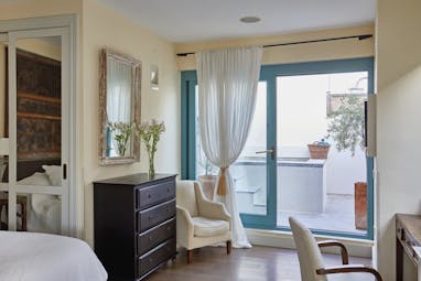 Corral del Rey Seville penthouse suite room leading to terrace and pool elegant décor
