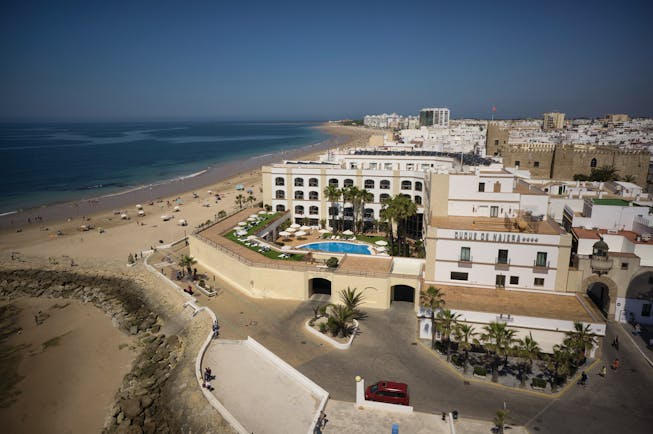 Duque de Najera Andalucia aerial shot hotel pool beach town in background