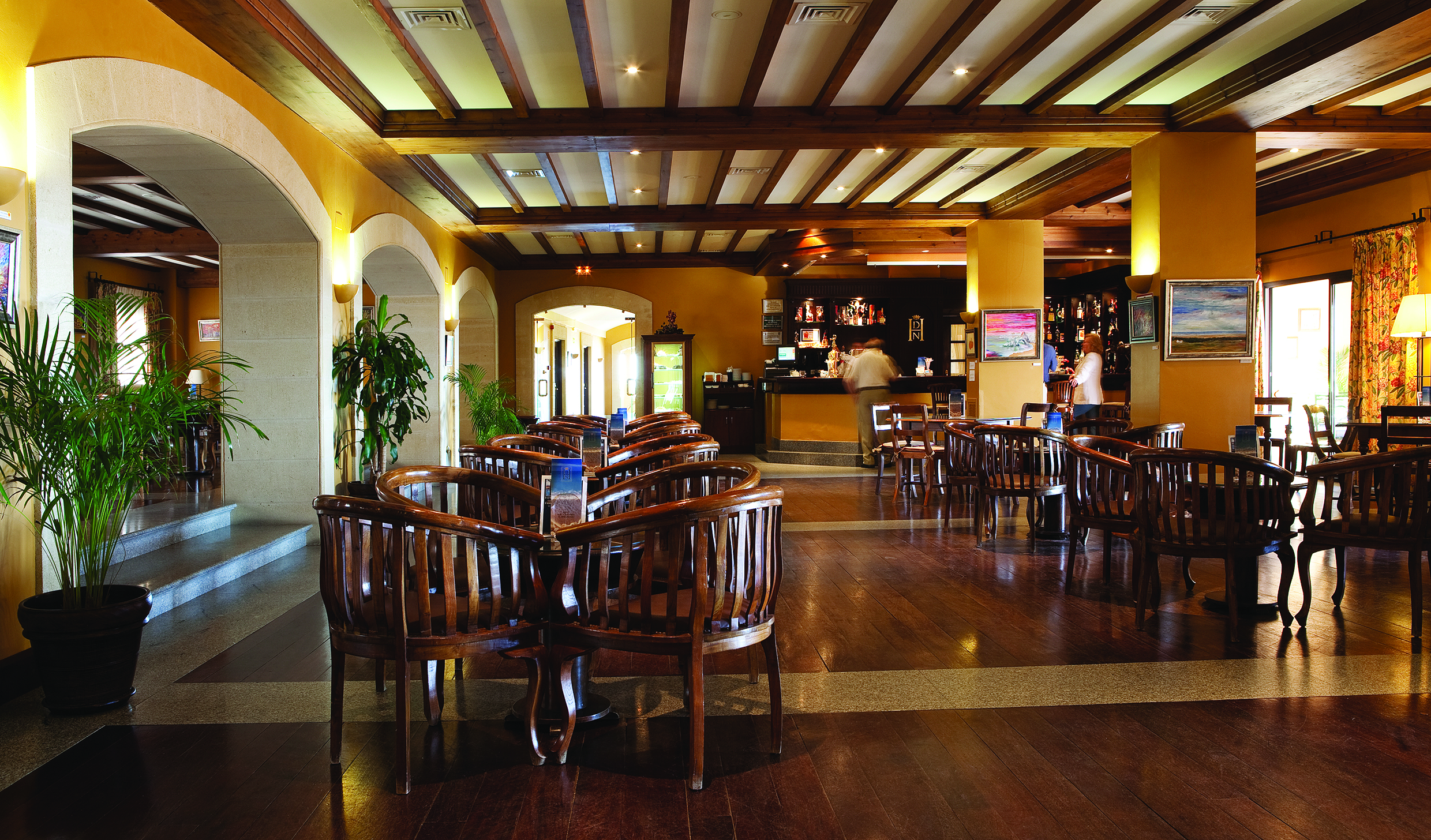 Duque de Najera Andalucia bar wooden seating area modern décor