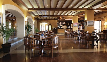 Duque de Najera Andalucia bar wooden seating area modern décor