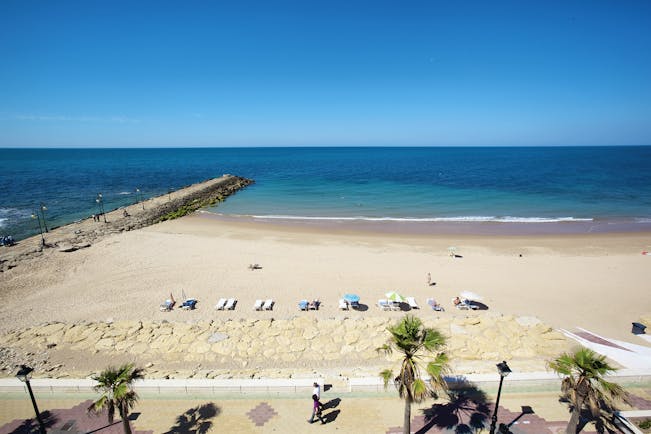 Duque de Najera Andalucia beach sandy beach sunbathers