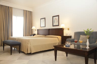Duque de Najera Andalucia superior double room bed sofa modern décor
