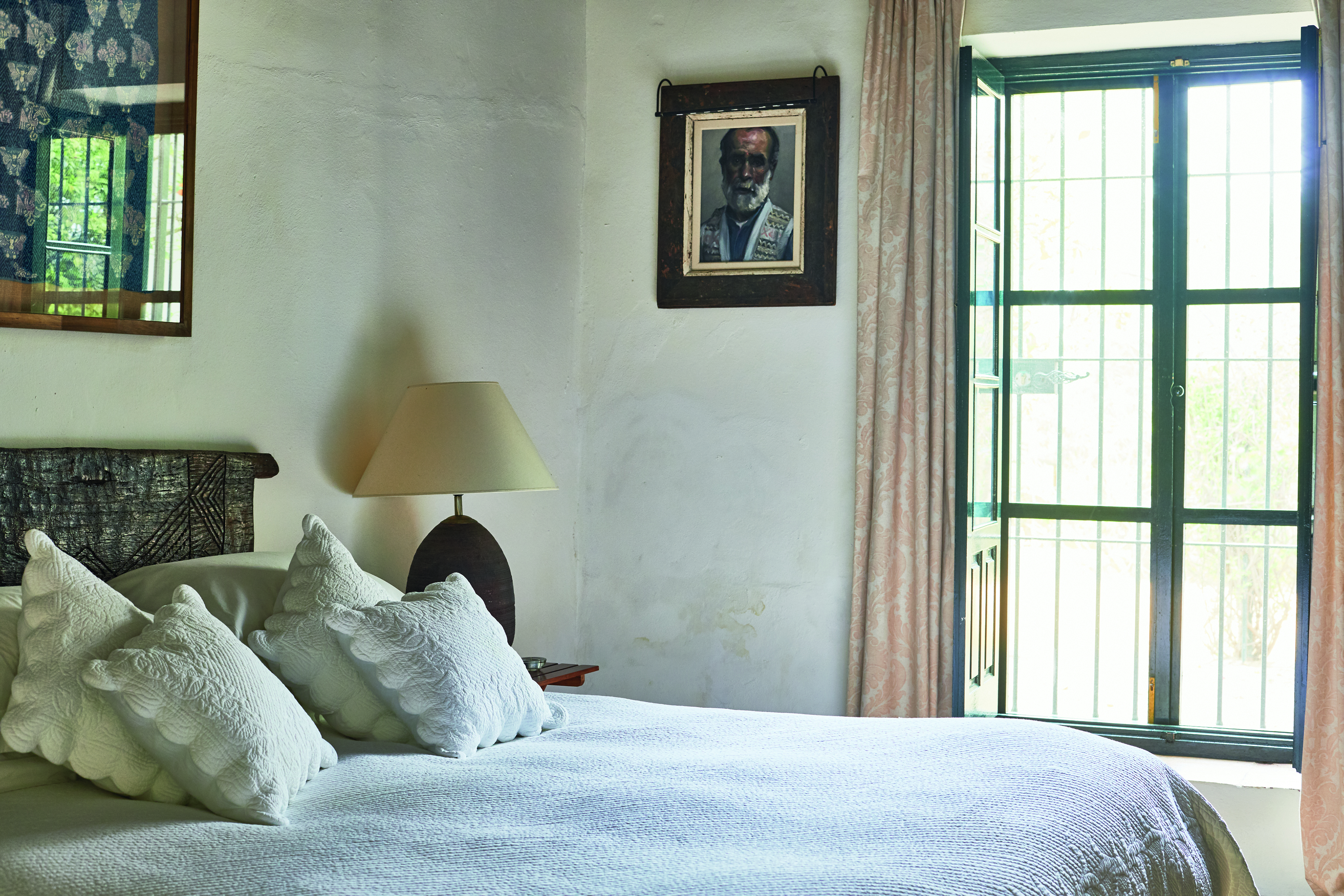 Hacienda de San Rafael Andalucia bedroom bed large window cosy decor