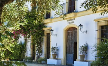 Hacienda de San Rafael Andalucia exterior white building hotel entrance greenery