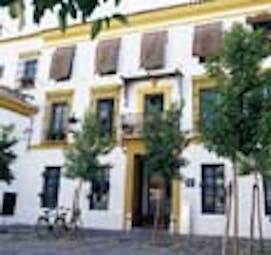 Las Casas del Rey Seville exterior white building yellow features trees