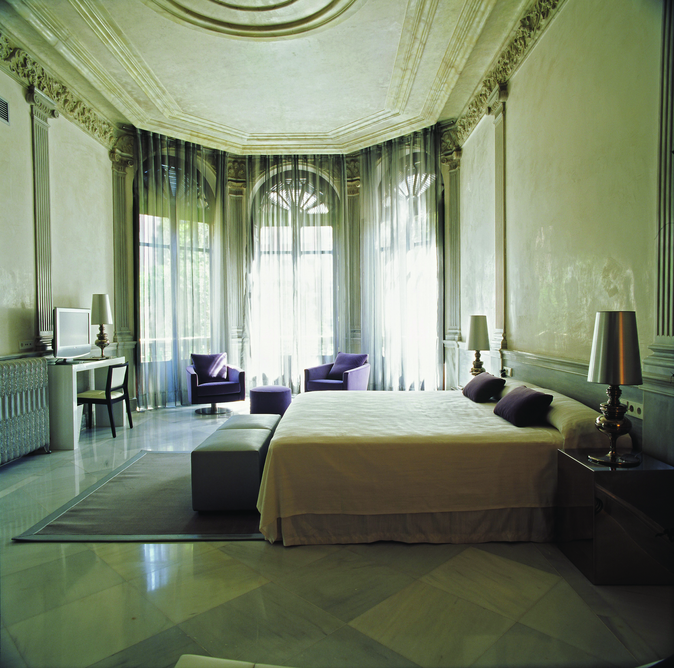 Palacio de los Patos Granada suite large windows modern décor