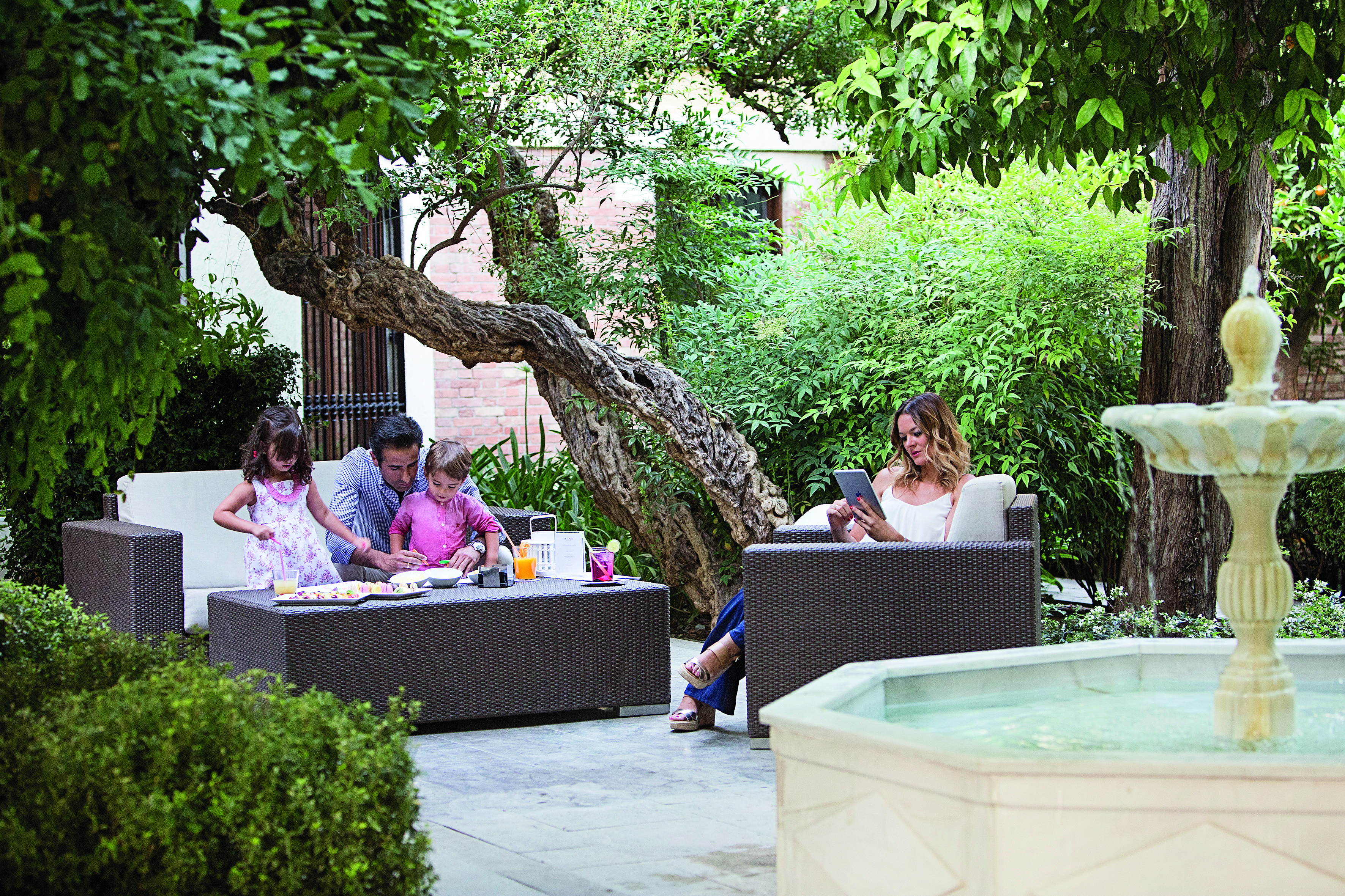 Palacio de los Patos Granada terrace outdoor seating family eating breakfast
