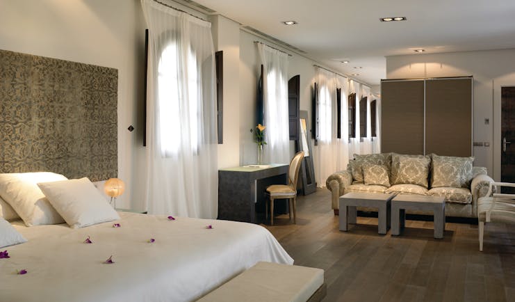 Palacio del Bailio Andalucia grand suite double bed sofa modern décor