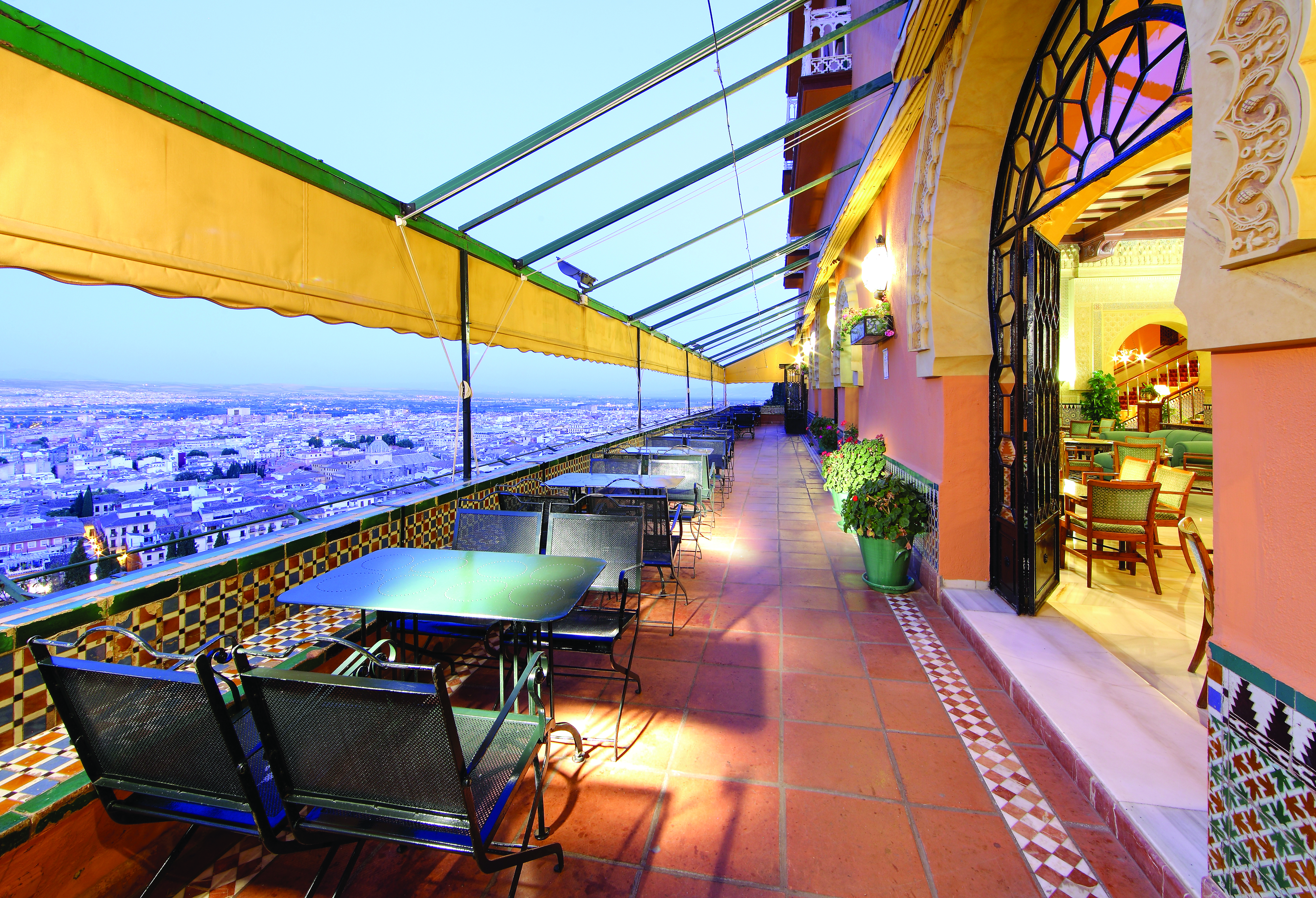 Terrace with black seating looking over Andalusia 