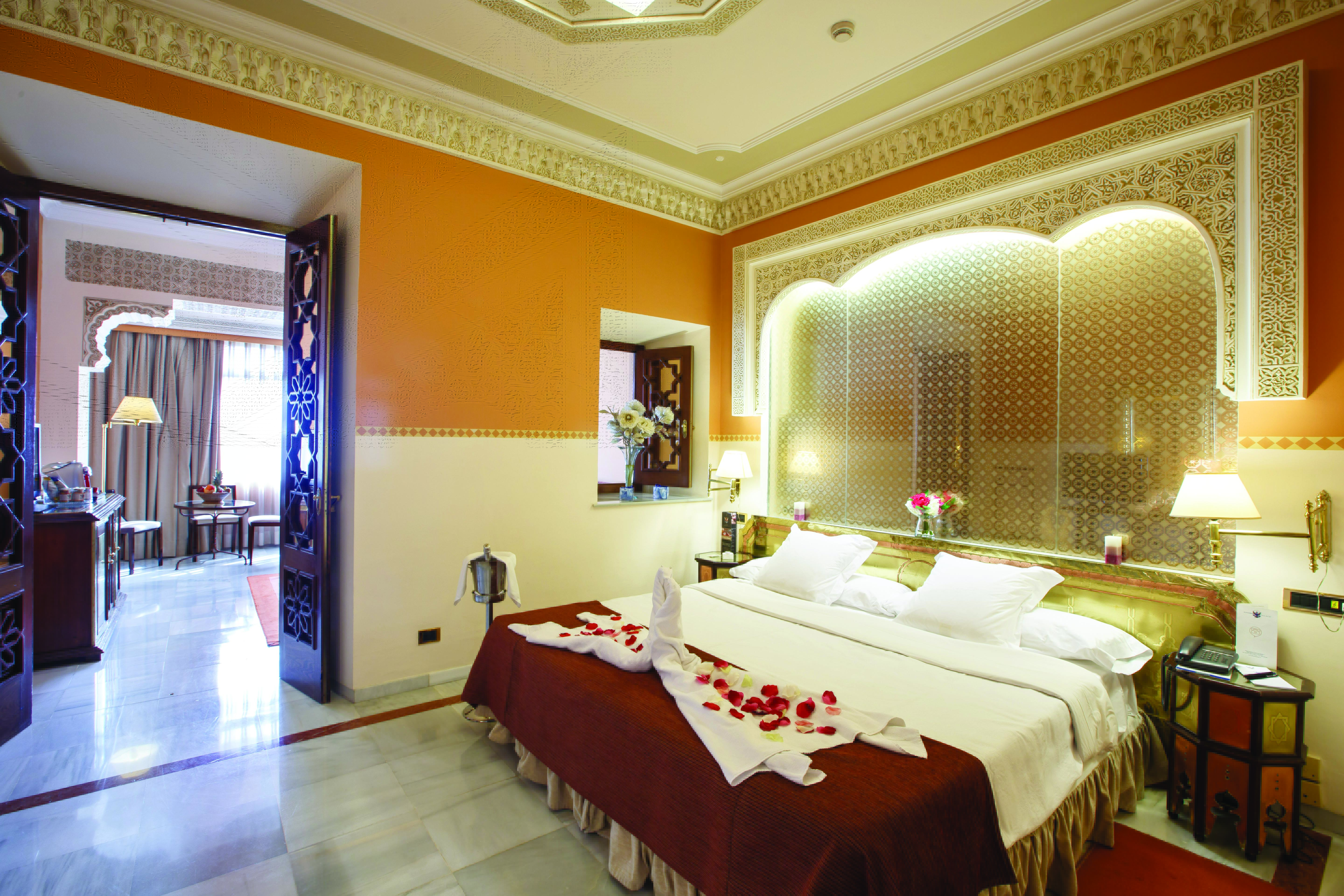 Hotel Alhambra Palace Granada junior suite opulent décor bedroom and living room