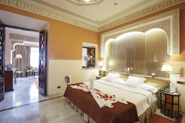 Hotel Alhambra Palace Granada junior suite opulent décor bedroom and living room