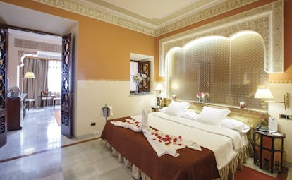 Hotel Alhambra Palace Granada junior suite opulent décor bedroom and living room