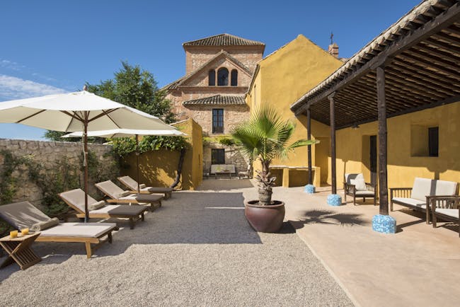 Cortijo de Marques Andalucia courtyard outdoor seating sun loungers
