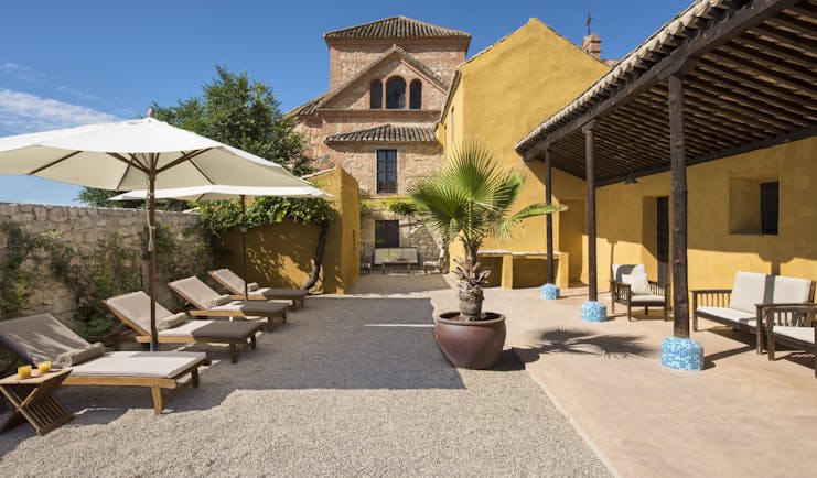 Cortijo de Marques Andalucia courtyard outdoor seating sun loungers