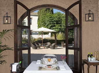Cortijo de Marques Andalucia dining restaurant doors leading to outside seating area