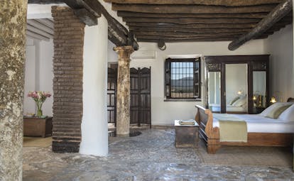 Cortijo de Marques Andalucia Los Aljibes family room bed wardrobe rustic architectural features