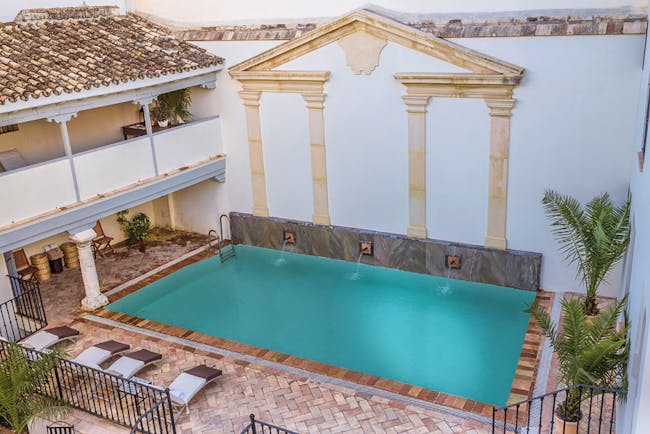 Las Casas de la Juderia Andalucia pool terrace walls around pool