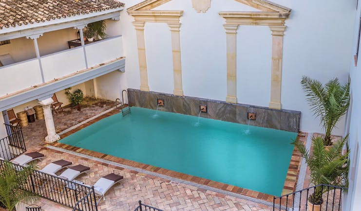 Las Casas de la Juderia Andalucia pool terrace walls around pool