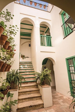 Las Casas de la Juderia Andalucia stairs stone steps plant pots