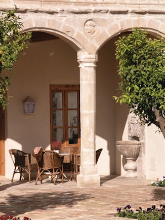 Hotel Puerta de la Luna Andalucia terrace outdoor seating area tables chairs