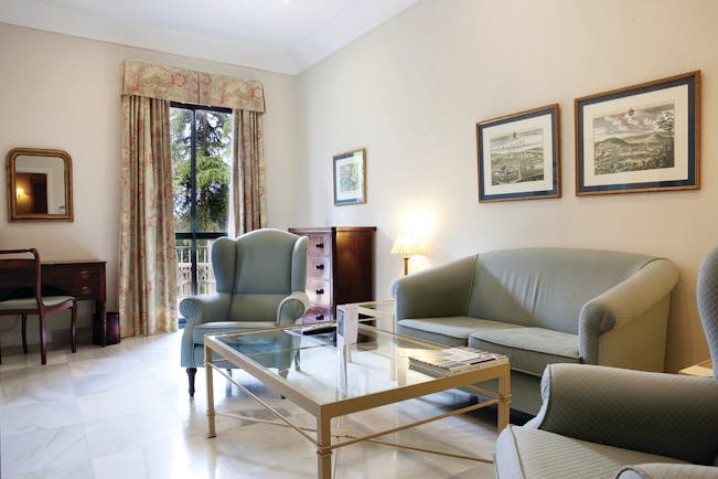 Villa Jerez Andalucia junior suite living area sofa armchairs elegant décor