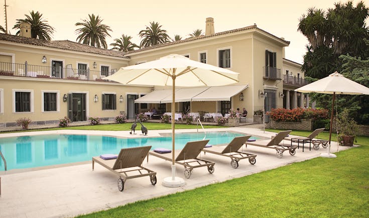 Villa Jerez Andalucia pool sun loungers umbrellas lawn