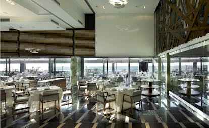 Parador de Cadiz Hotel Atlantico restaurant, modern decor, tables, chairs, wide windows, sea views