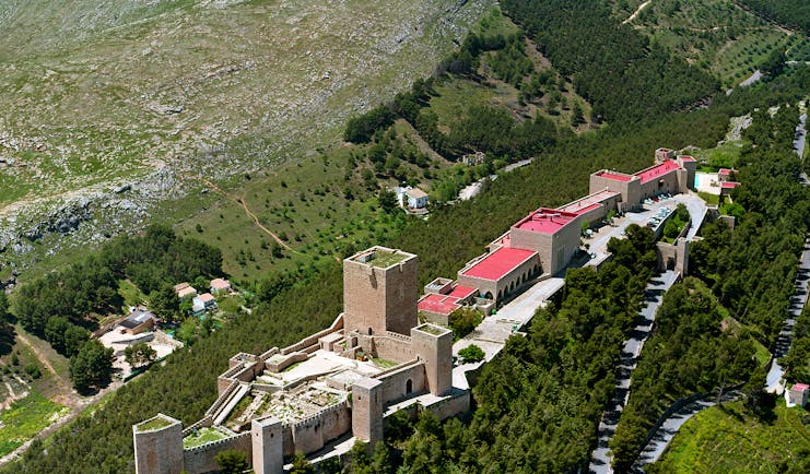 view of Parador de Jaen from above showing keep and castle walls
