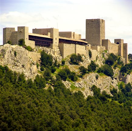 Castle walls with tower and keep on hilltop of the Parador de Jaen