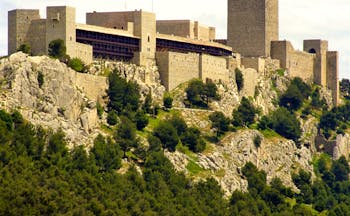 Castle walls with tower and keep on hilltop of the Parador de Jaen