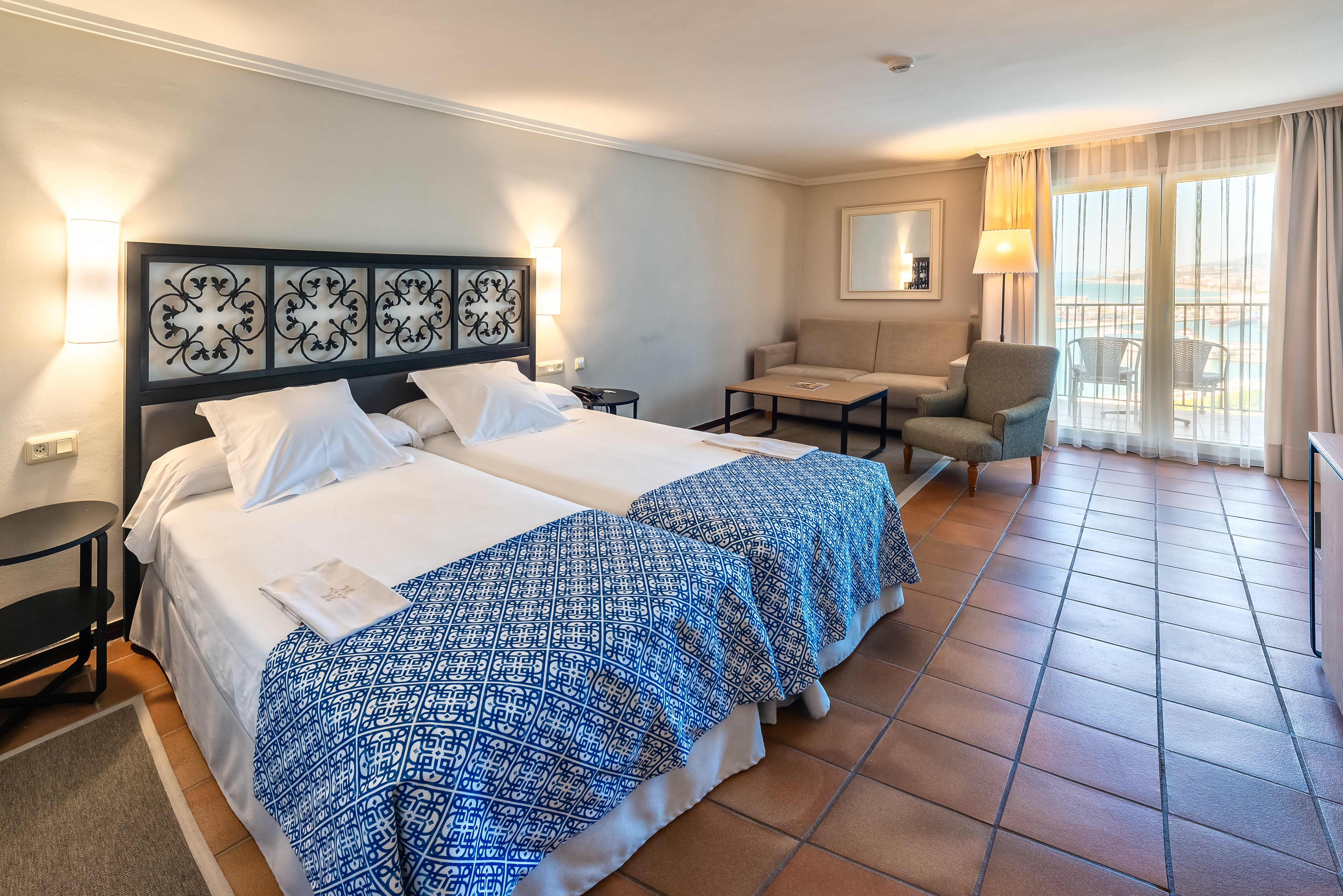 Parador de Malaga Gibralfaro standard room, tiled floor, doors leading to balcony
