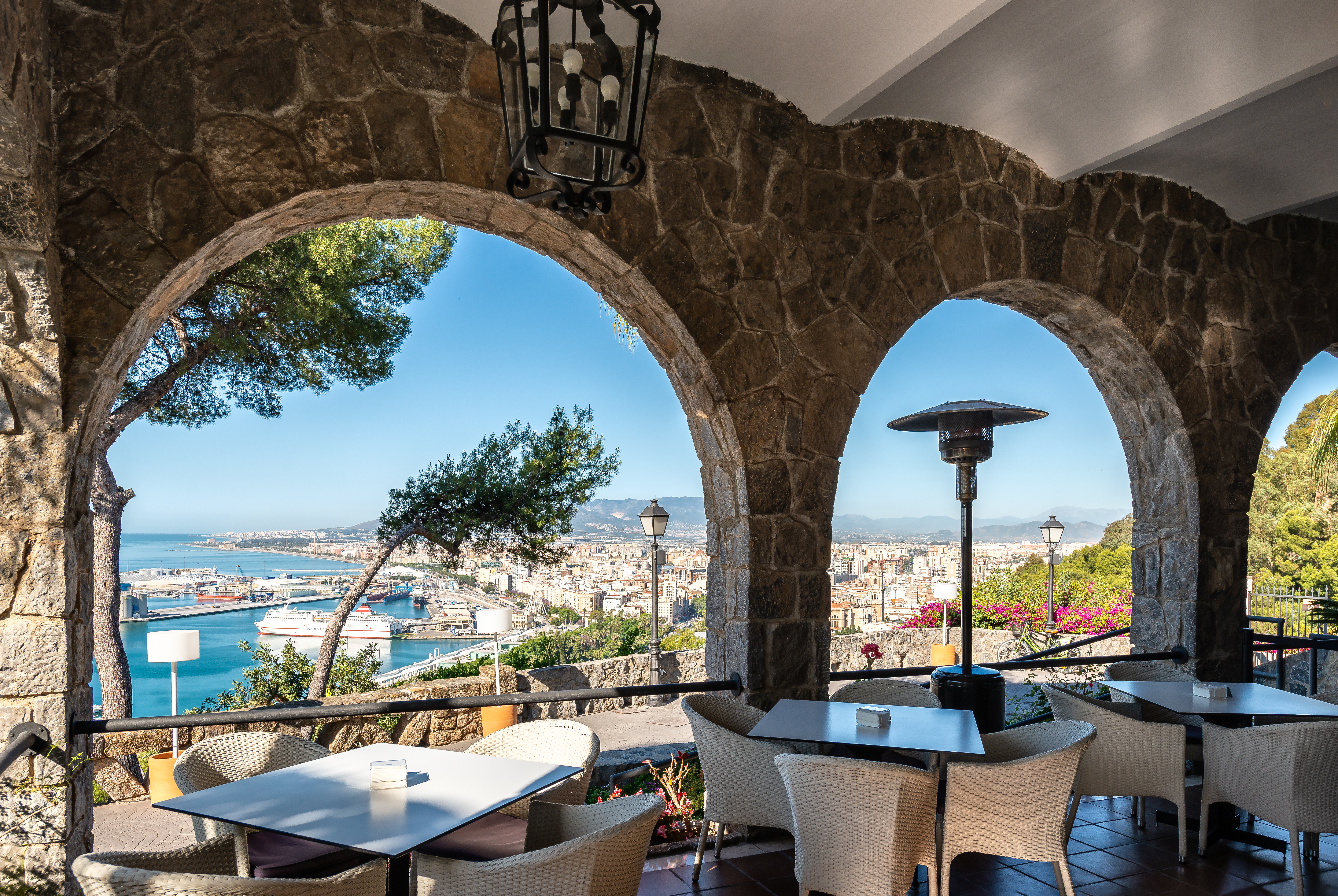 Parador de Malaga Gibralfaro terrace cafe, outdoor covered dining area, overlooking coast
