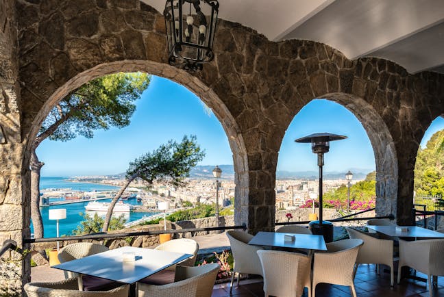 Parador de Malaga Gibralfaro terrace cafe, outdoor covered dining area, overlooking coast