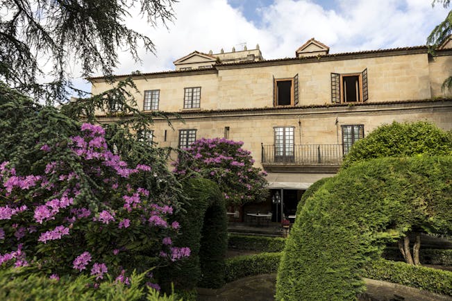 Parador de Pontevedra gardens, hotel building, traditional architecture, terrace, trees and shrubbery