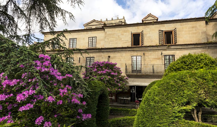 Parador de Pontevedra gardens, hotel building, traditional architecture, terrace, trees and shrubbery