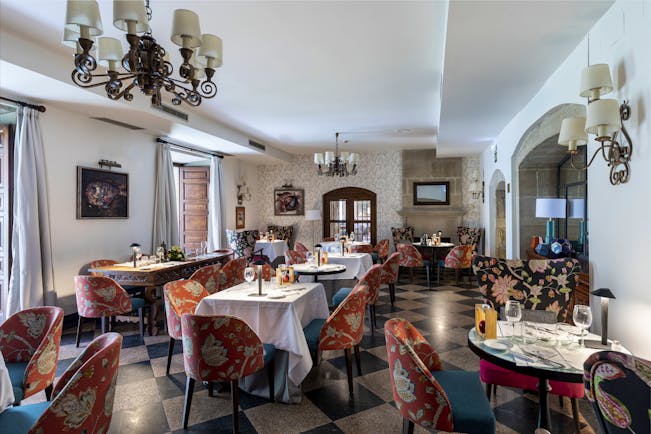 Parador de Pontevedra restaurant, tables, brightly coloured chairs, clean fresh decor