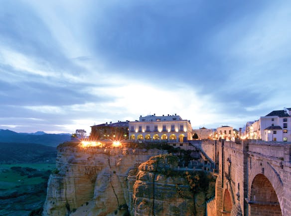 Parador de Ronda Andalucia exterior cliffside hotel city countryside in background