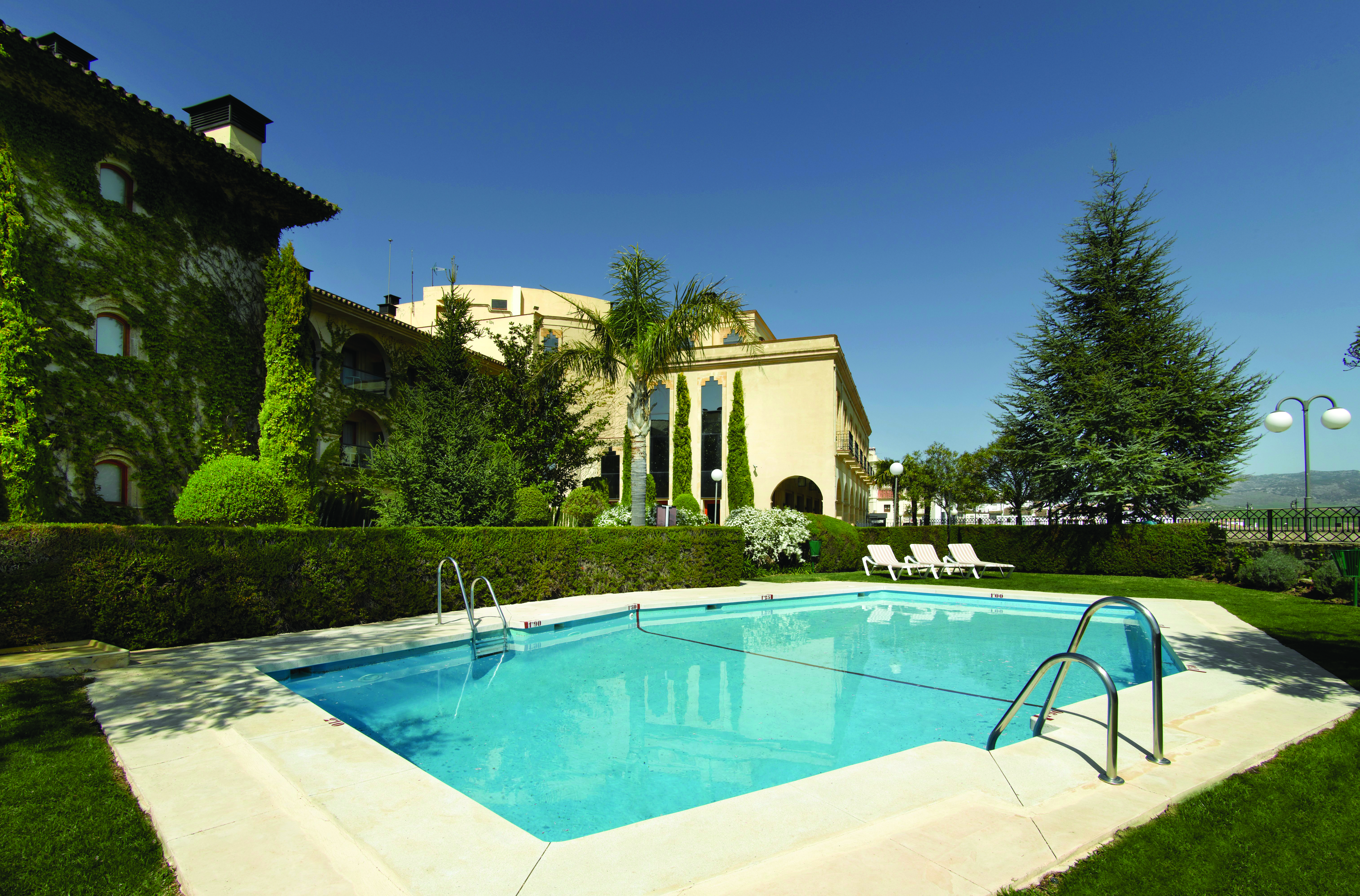 Parador de Ronda Andalucia pool sun loungers lawns