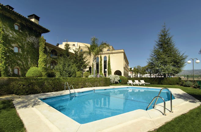 Parador de Ronda Andalucia pool sun loungers lawns
