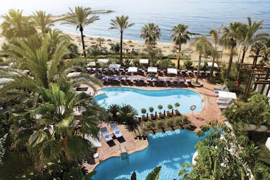 Hotel Puente Romano Marbella pools aerial shot loungers beach in background