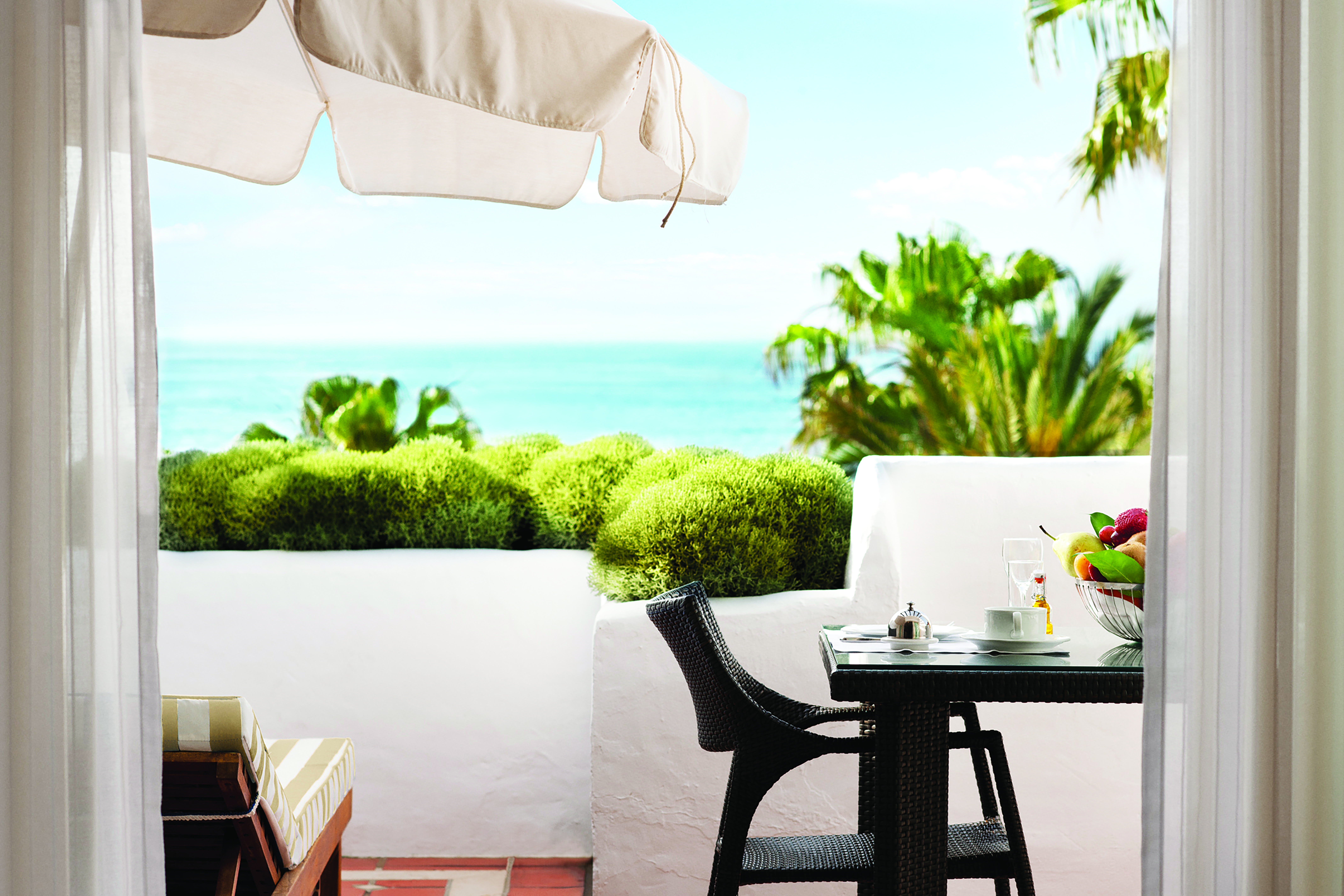 Puente Romano Marbella grand junior suite terrace private outdoor seating ocean views