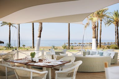 Puente Romano Marbella restaurant terrace outdoor dining sea views
