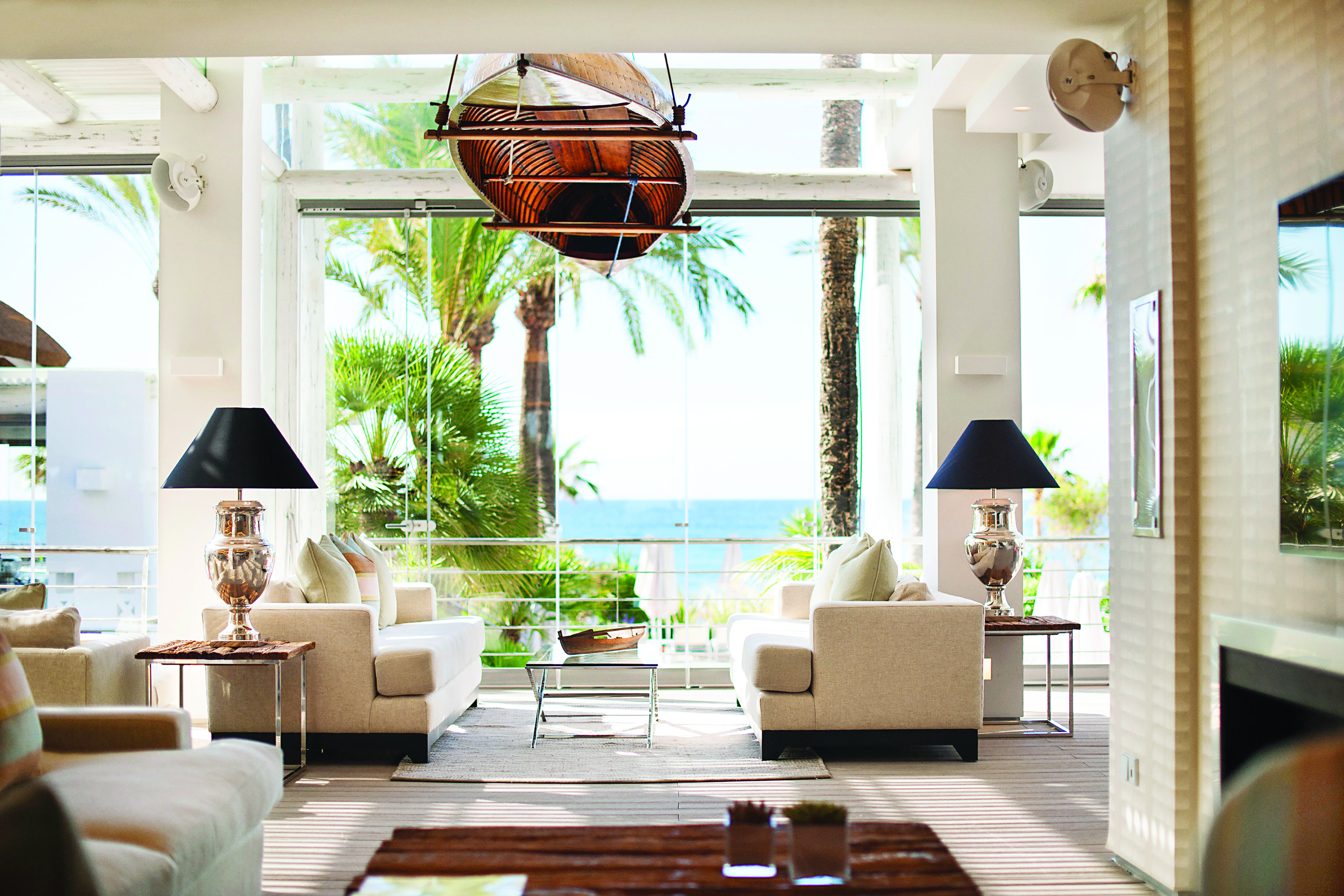 Puente Romano Marbella sea grill restaurant indoor dining sofas elegant décor